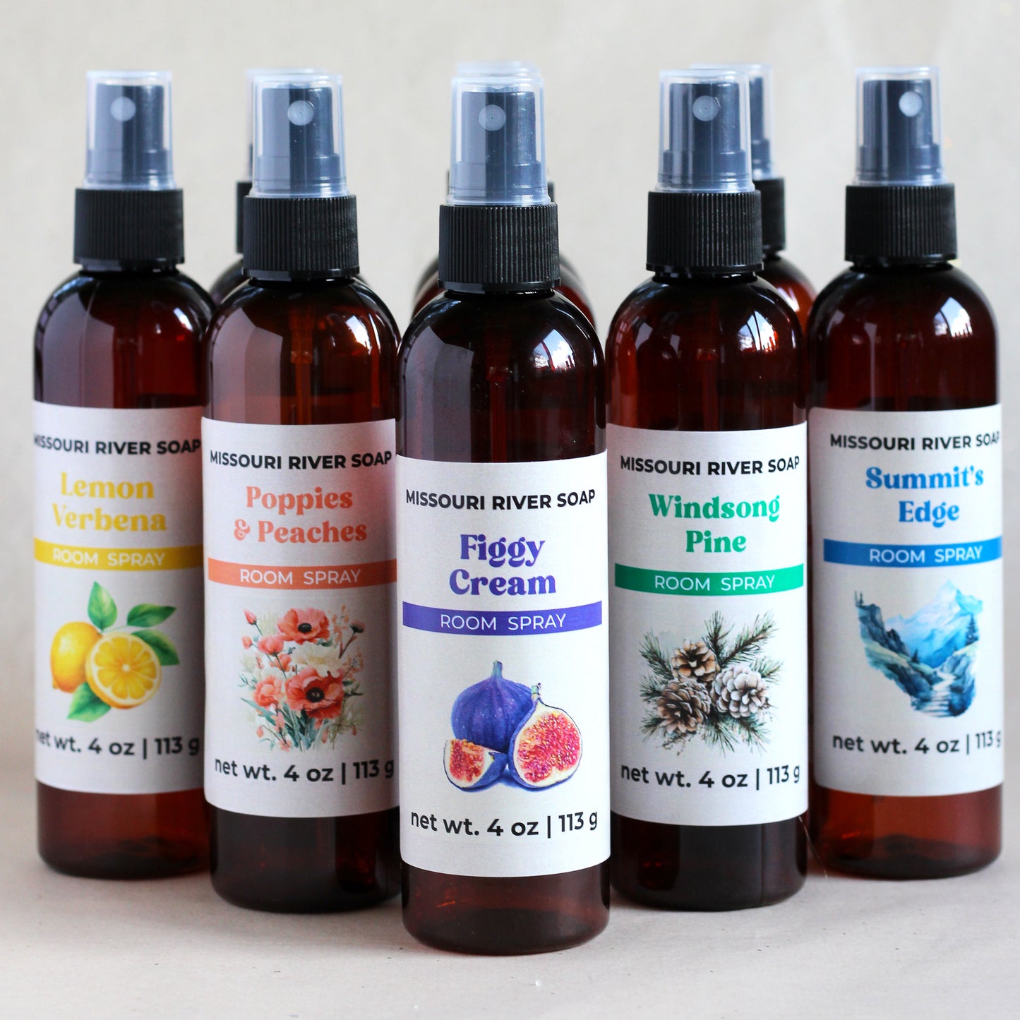 Missouri River Soap room spray bottles with various scents on a white background