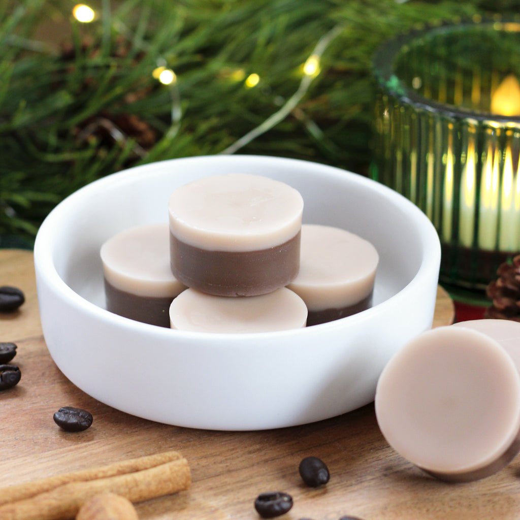 Missouri River Soap Cookies, Coffee & Claus wax melts – disk-shaped in brown and cream colors, releasing a warm, festive blend of espresso, cream, brown sugar, vanilla, sugar cookies, and graham crackers.