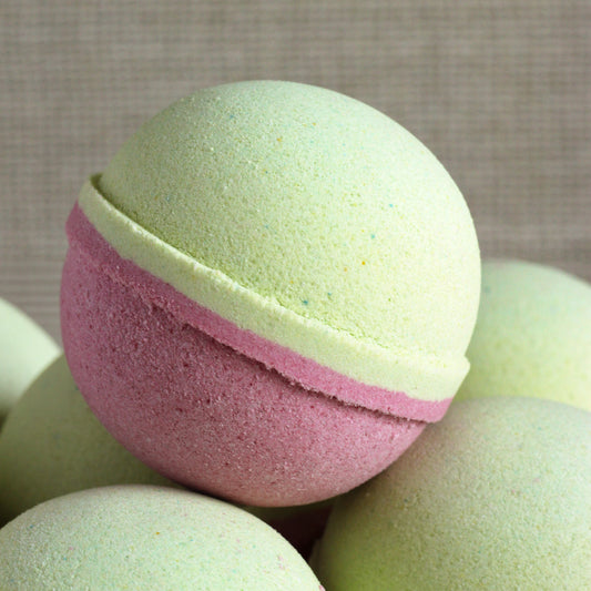 Pink and lime green Cranberry Limeade bath bomb handcrafted by Missouri River Soap