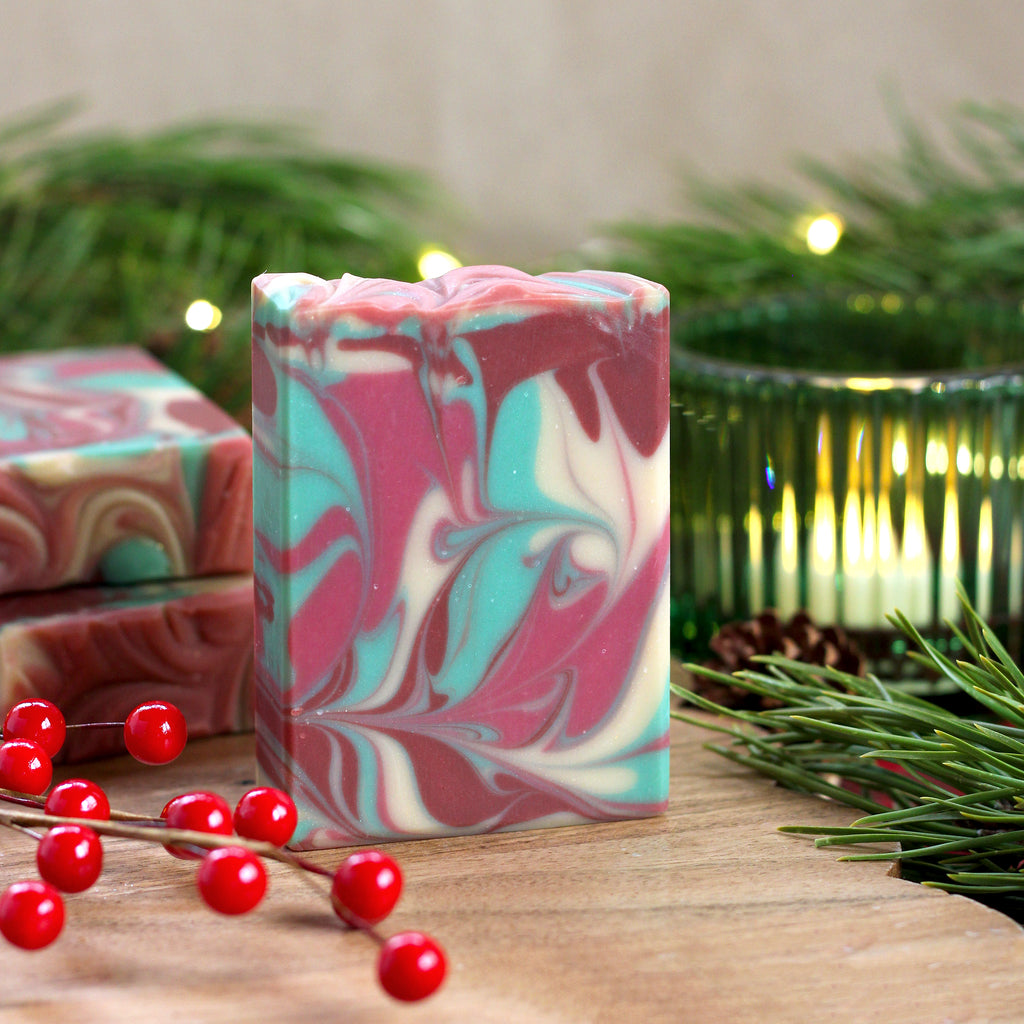 Missouri River Soap Cranberry Woodland – festive swirled red, green, and gold soap, cranberry and woodland-inspired scent with citrus, raspberry, violet, and sandalwood