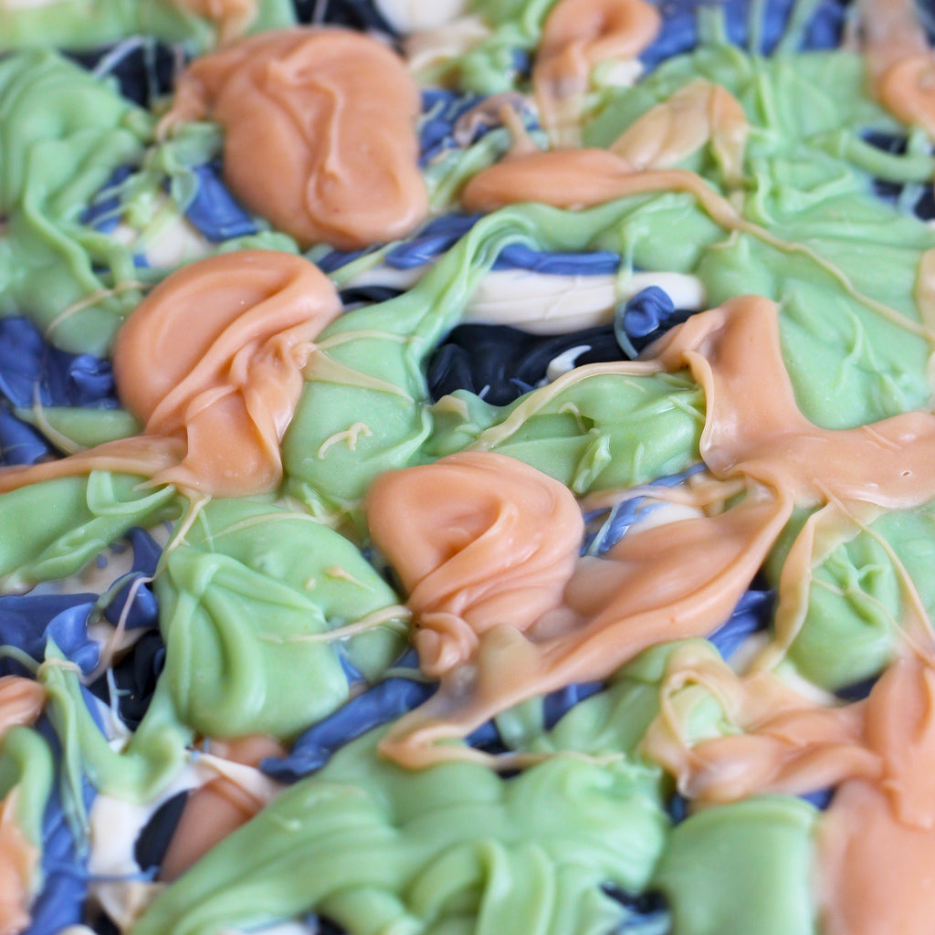 Close up of colorful soap splatters