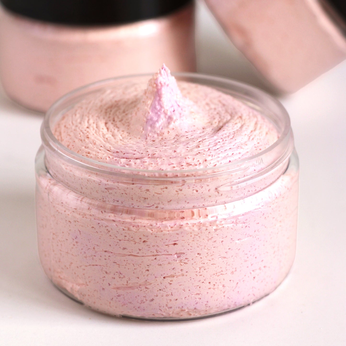Missouri River Soap Peach Mango Sangria Whipped Soap Sugar Scrub in a 4 oz clear jar with swirls of pink and peach.