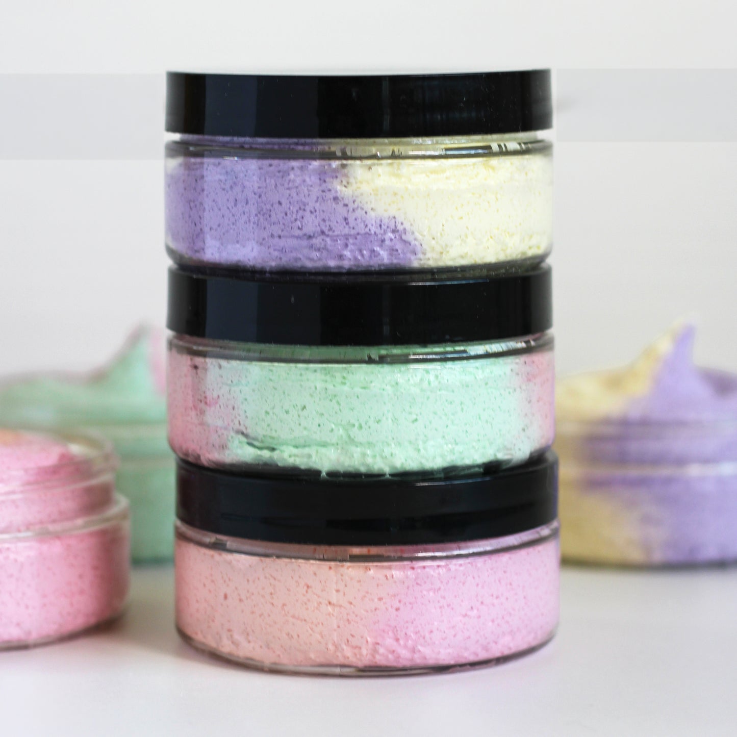 Missouri River Soap Summer Sips Whipped Soap Scrub Sampler featuring three 3 oz sugar scrubs in Cranberry Limeade, Berry Lemonade, and Peach Mango Sangria.