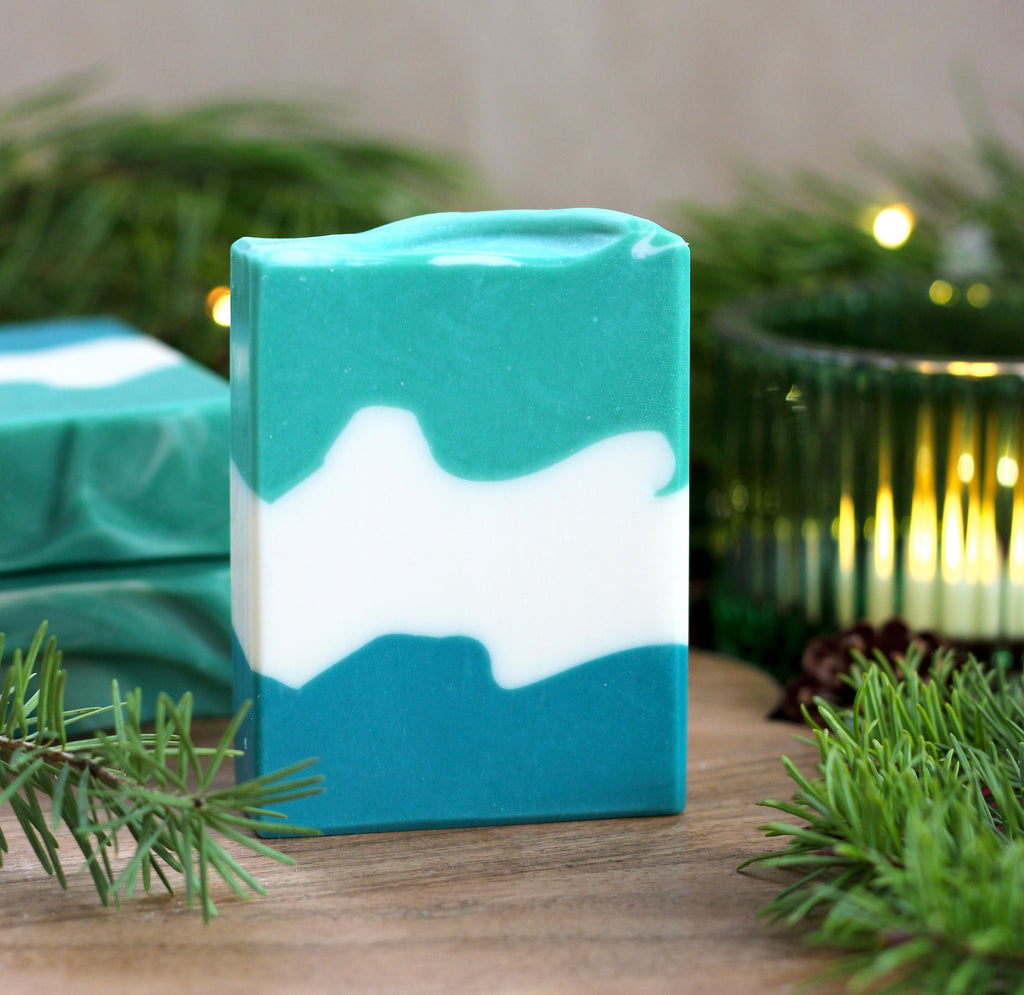 Missouri River Soap Snow Drift – handcrafted layered soap in blue-green, white, and green, holiday-inspired cedar and sandalwood scent