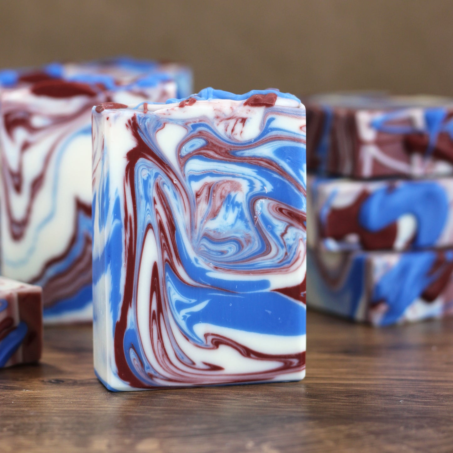Handcrafted Where the Eagles Fly artisan soap featuring a red, white, and blue patriotic swirl design. Scented with fresh mountain air, crisp redwood, and warm cedarwood. Handmade by Missouri River Soap