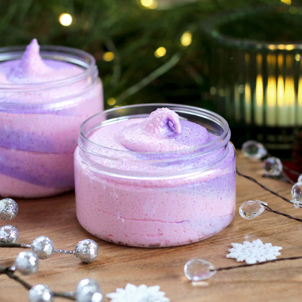 Missouri River Soap Winter Mittens Whipped Sugar Scrub – festive whipped sugar scrub swirled in pink and purple; scented with cherry, pear, creamy vanilla, and spun sugar for a playful, holiday-inspired treat.